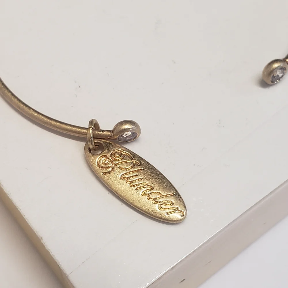 Plunder Gold Tone Crystal End Cuff Bracelet